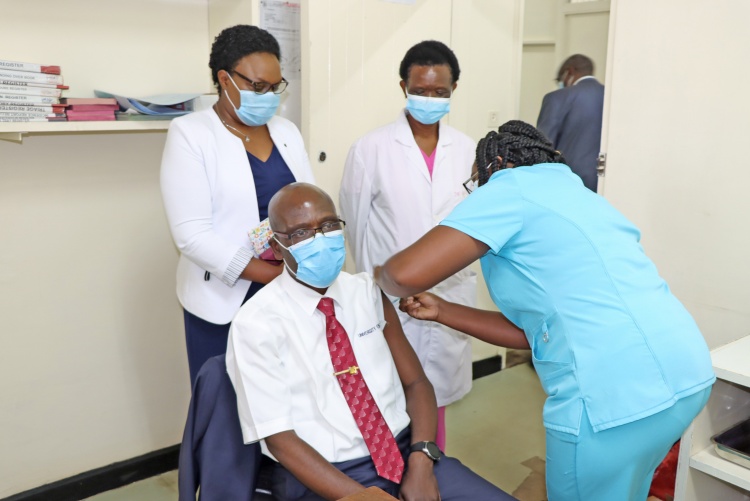 Deputy Vice Chancellor Academic Affairs Prof. Julius Ogeng'o receives COVID-19 jab.