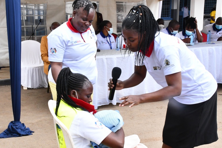 Medical officers presenting a skit on safe maternal care.