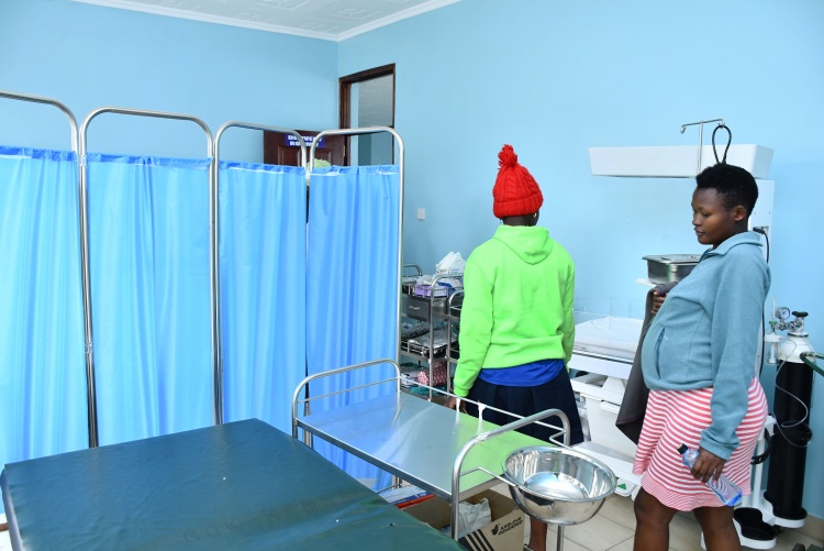 Mothers touring the new maternity wing.