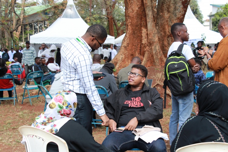 Parents and students waiting for admissions