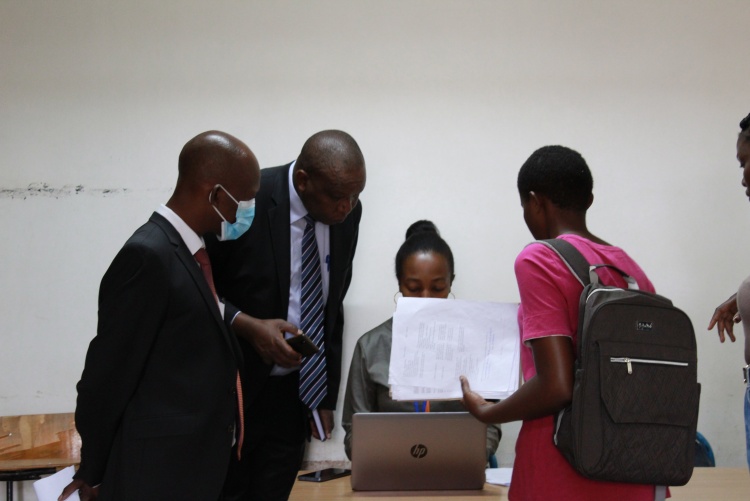 Faculty Dean observing registration during admission