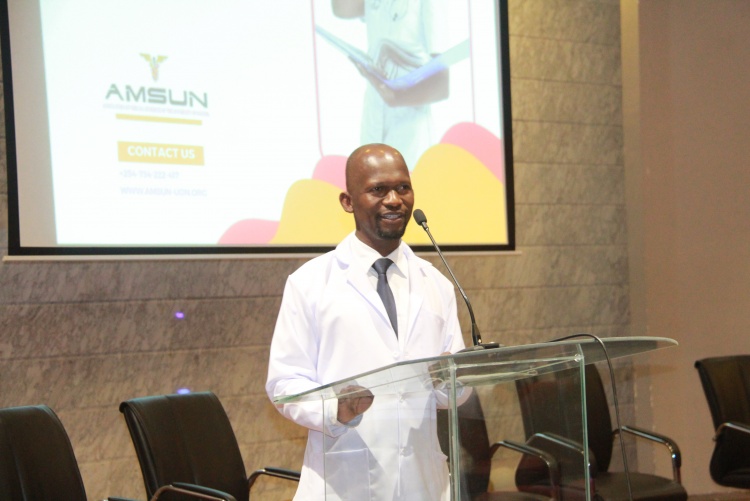 The Faculty Dean addressing the students