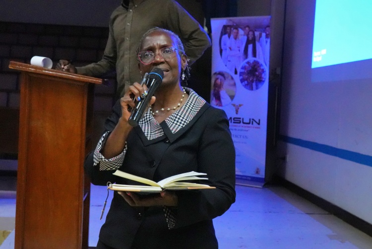 Prof. Elizabeth Bukusi makes a presentation during the AMSUN pre-conference talk.