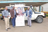 Christian Aid Country Manager Njoroge Mucheru (far right) hands over car keys to Prof. James Machoki, Dean Faculty of Health Sciences, looking on is Joseph Waigwi, Faculty Registrar.