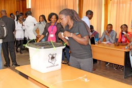 A student casts her vote during UNSA elections in 2019.