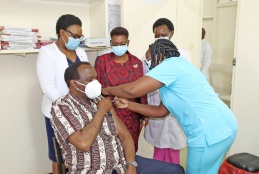 College of Health Sciences Principal, Prof. James Machoki gets COVID-19 vaccine.