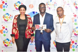 Mental Health Challenge winner Victor Baraza Wandera (C) with Ms Nadia Ahmed, Chief Administrative Secretary-Ministry of ICT, Innovations, and Youth Affairs (L).