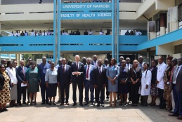 a group photo of the chancellor and other members of staff at FHS 