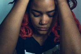 Image of a seemingly stressed woman.